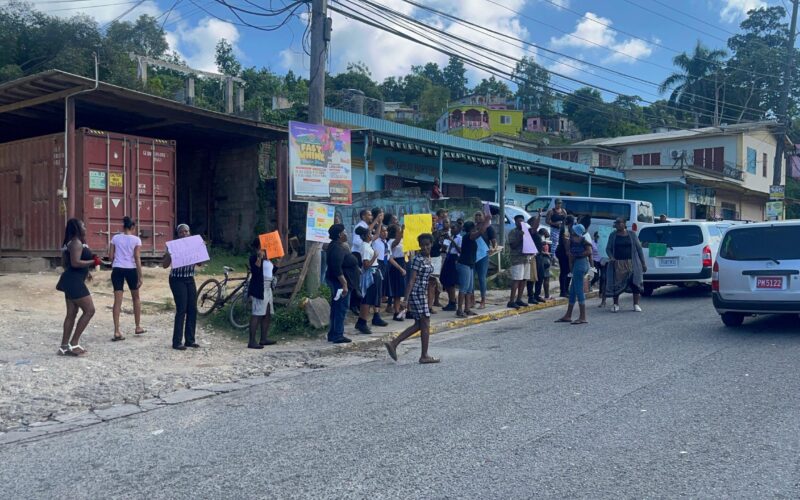 Oracabessa Primary school community protest treatment of 11-year-old student by police during traffic stop